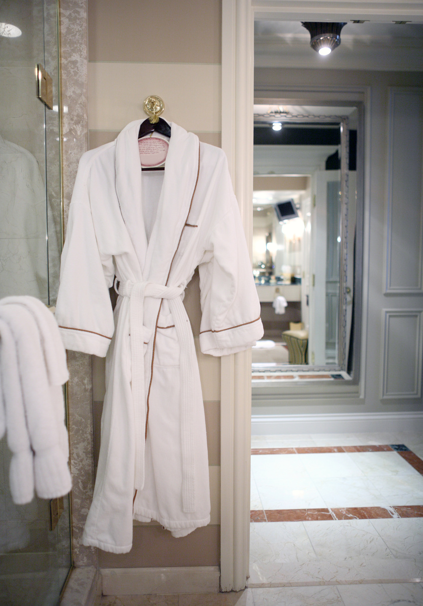 Plush robe in fancy hotel room